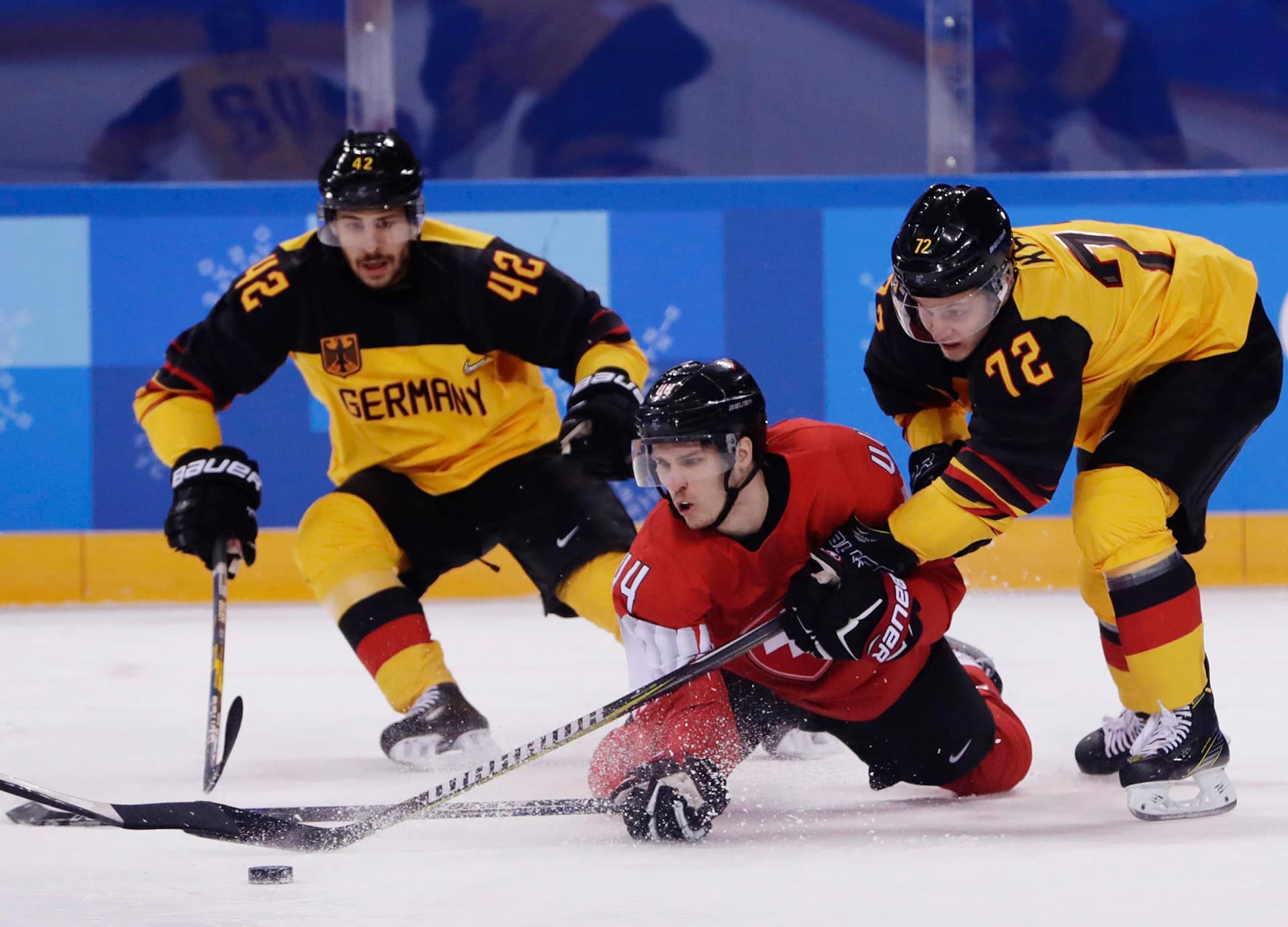 Hockey germany. Германия Швейцария хоккей. Хоккеисты Германии. Сборная Германии по хоккею. Германия игроки хоккей.